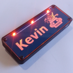 3D printed and laser cut name tag on custom circuit board